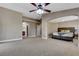 Main bedroom with high ceilings, ceiling fan, and access to bathroom at 433 Hidden Hole Dr, Las Vegas, NV 89148