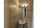 Clean bathroom with pedestal sink, toilet and mirror at 5070 Tara Ave # 119, Las Vegas, NV 89146