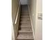 Indoor staircase with wood-look laminate flooring at 5070 Tara Ave # 119, Las Vegas, NV 89146