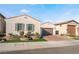 Front view of house with two-car garage at 689 Corelli Cove St, Henderson, NV 89011