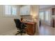 Home office with built-in desk and cabinets, providing a dedicated workspace at 8908 Marble Dr, Las Vegas, NV 89134