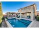 Gorgeous backyard oasis featuring a pool and pergola at 924 Monte Nerone Ave, Henderson, NV 89012