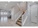 Elegant staircase connecting the entryway to upper levels at 924 Monte Nerone Ave, Henderson, NV 89012