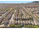 Aerial view of a community, showing numerous houses with similar architectural styles and landscaping at 9532 Parker Springs Ct, Las Vegas, NV 89166