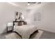 Bright bedroom with a king-size bed, neutral color palette, and large window with shutters at 10004 Terrastone Dr, Las Vegas, NV 89148