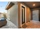 Inviting entryway with a modern door and brick pavers at 10004 Terrastone Dr, Las Vegas, NV 89148