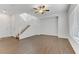 Living room with hardwood floors and staircase at 1018 Maple Pines Ave, North Las Vegas, NV 89081