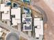 Aerial view of modern homes with solar panels and desert landscape at 12 Falling Canyon Ct, Henderson, NV 89011