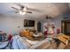 Living room with sectional sofa, TV, and Christmas tree at 1625 Phillips Ave, Las Vegas, NV 89104