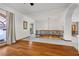 Elegant hallway with hardwood floors and an ornate iron railing overlooking the lower level at 220 Hallett Cove Ct, Boulder City, NV 89005