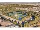 Community tennis courts with surrounding landscape at 28 Tea Olive Dr, Las Vegas, NV 89141