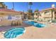 Community pool and spa with lounge chairs and signage at 354 Sunward Dr # 354, Henderson, NV 89014