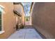 Small, private backyard with patio and gravel landscaping at 4327 Bassae Temple Ave, North Las Vegas, NV 89031