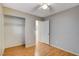 Bright bedroom with wood flooring and spacious closet at 501 Riata Way, Las Vegas, NV 89110