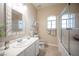 Clean bathroom with a single vanity and a shower/tub combo at 5415 W Harmon Ave # 1105, Las Vegas, NV 89103