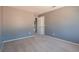 Empty bedroom with gray walls and carpeted floor at 5415 W Harmon Ave # 2056, Las Vegas, NV 89103