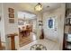 Entryway with tile floor and view into the dining area at 5480 Lincolnwood Ct, Pahrump, NV 89061