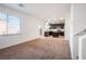 Bright living room with an open kitchen view at 628 Taliput Palm Pl, Henderson, NV 89011