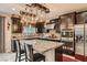 Spacious kitchen featuring granite countertops, stainless steel appliances, and a large island at 7788 Ebro Valley Ct, Las Vegas, NV 89113