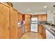 Well-equipped kitchen with ample cabinetry and a corner sink at 7831 Rancho Destino Rd, Las Vegas, NV 89123