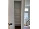 Open pantry with white shelves and wood-look floor at , Las Vegas, NV 89147