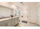 Modern bathroom with double vanity and walk-in shower at 10956 Meridian Fields Ave, Las Vegas, NV 89166