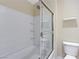 Bathroom with shower/tub combo and built-in shelves at 153 Sitka Spruce St, Henderson, NV 89015