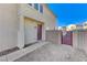 House exterior with a red door and small patio at 153 Sitka Spruce St, Henderson, NV 89015