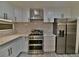 Modern kitchen features stainless steel appliances and white cabinets at 1716 Cochran St, Las Vegas, NV 89104