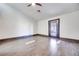 Bedroom with hardwood floors and sliding barn door at 188 Beach Oak Ave, Henderson, NV 89002