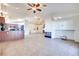 Open living area with tile floors and a fireplace at 188 Beach Oak Ave, Henderson, NV 89002