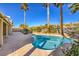 Inviting kidney-shaped pool in backyard oasis at 2894 Matese Dr, Henderson, NV 89052