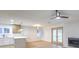 Kitchen and dining area with light flooring and french doors at 336 Merit Ct, Henderson, NV 89014