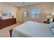 Comfortable bedroom with backyard view and plenty of natural light at 5528 Eleganza Ave, Pahrump, NV 89061