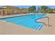 Community lap pool with spacious deck area at 5528 Eleganza Ave, Pahrump, NV 89061