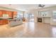 Spacious kitchen with island, wood cabinets, and tile flooring at 5878 Rothbury Ave, Las Vegas, NV 89141