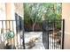 Private backyard with a gate and small patio at 6437 Boatbill St, North Las Vegas, NV 89084