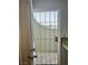 White patio door leading to a private patio area at 7042 Burcot Ave # A72, Las Vegas, NV 89156