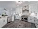 Gourmet kitchen with stainless steel appliances and marble backsplash at 10965 Inverlochy Ct, Las Vegas, NV 89141