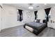 Modern bedroom with king-size bed and sleek furnishings at 1168 Spago Ln, Henderson, NV 89052