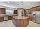 Large kitchen with granite countertops and stainless steel appliances at 1788 Amarone Way, Henderson, NV 89012