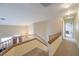 Upstairs hallway with view of bedrooms and staircase at 1808 Cedar Bluffs Way, Las Vegas, NV 89128