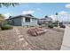 Ranch style home with a landscaped front yard and walkway at 2058 Citroen St, Las Vegas, NV 89142