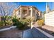 Building exterior showing landscaping and walkway at 2110 Los Feliz St # 1097, Las Vegas, NV 89156