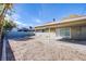 Large backyard with covered patio and concrete slab at 26 Jade Cir, Las Vegas, NV 89106