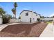 Large backyard with gravel landscaping and a paved pathway at 2739 Topaz Ct, Las Vegas, NV 89121