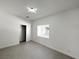 Simple bedroom with grey flooring, a closet and window seat at 3212 Gaucho Dr, Las Vegas, NV 89169