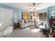 Living room with light wood floors and blue walls at 3225 Casey Dr # 103, Las Vegas, NV 89120