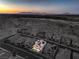 Bird's-eye view of a beautiful house with a pool and mountain backdrop at 4039 Montone Ave, Las Vegas, NV 89141