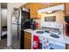 Kitchen with stove, refrigerator, and ample counter space at 582 Grimsby Ave, Henderson, NV 89014